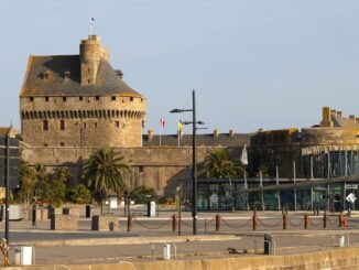 Explore the medieval charm of Saint-Malo's iconic fortifications bathed in sunlight.