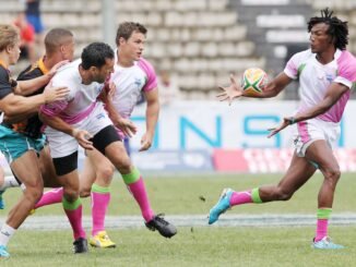 Rugby players in action showcasing teamwork and athleticism during a match.