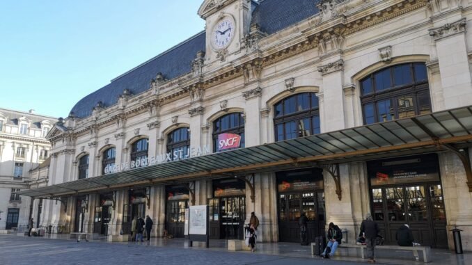 Exterior view of Gare de Bordeaux-Saint-Jean, a key railway station in Bordeaux, France.